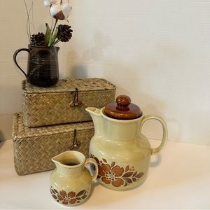 Vintage tea pot with matching creamer
